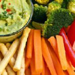 Dip into Health: Vibrant Guacamole with Fresh Veggie Sticks